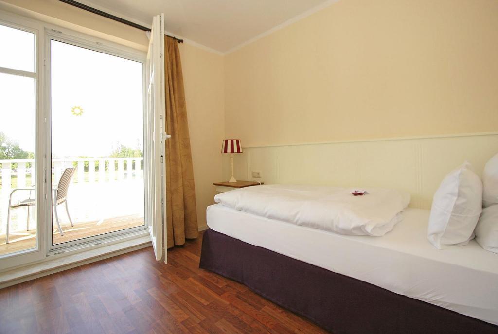 Aparthotel Saatmann Garni Ahrenshoop Rom bilde